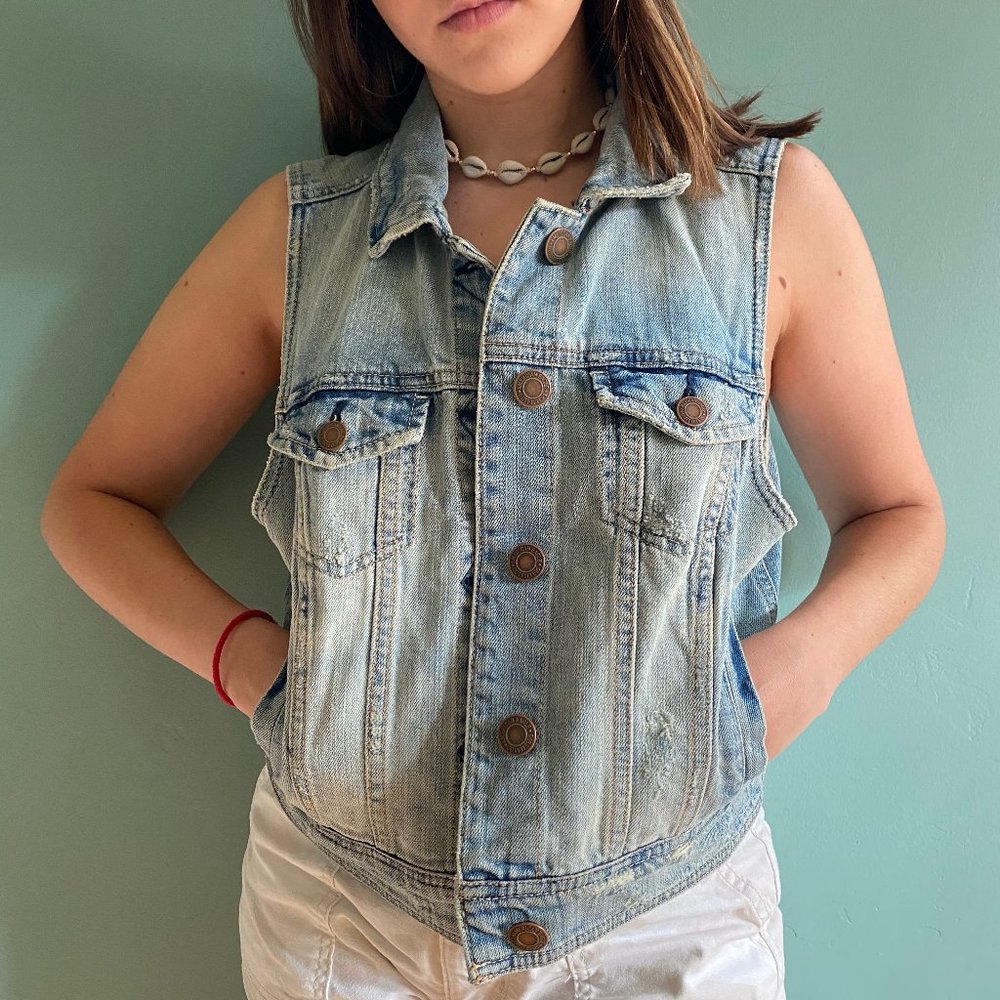 light-washed denim vest with copper buttons